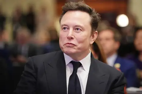Elon Musk Predicts AI Will Make Work ‘Optional’ and Money ‘Obsolete’